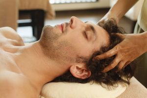 man-relaxing-getting-massage
